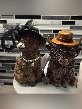 Hobby Lobby Pair of Brown Highland Cow Figurines with Black Hat and Orange Hat